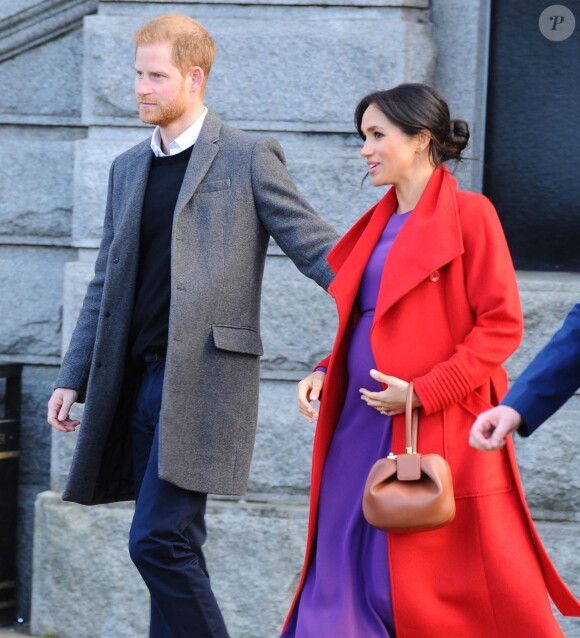 Le prince Harry, duc de Sussex et Meghan Markle (enceinte), duchesse de Sussex en visite à Birkenhead le 14 janvier 2019.