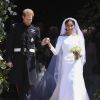 Théma - Givenchy habille les mariées royales - Le prince Harry, duc de Sussex, et Meghan Markle, duchesse de Sussex, à la sortie de chapelle St. George au château de Windsor - Sortie après la cérémonie de mariage du prince Harry et de Meghan Markle en la chapelle Saint-George au château de Windsor, Royaume Uni, le 19 mai 2018.