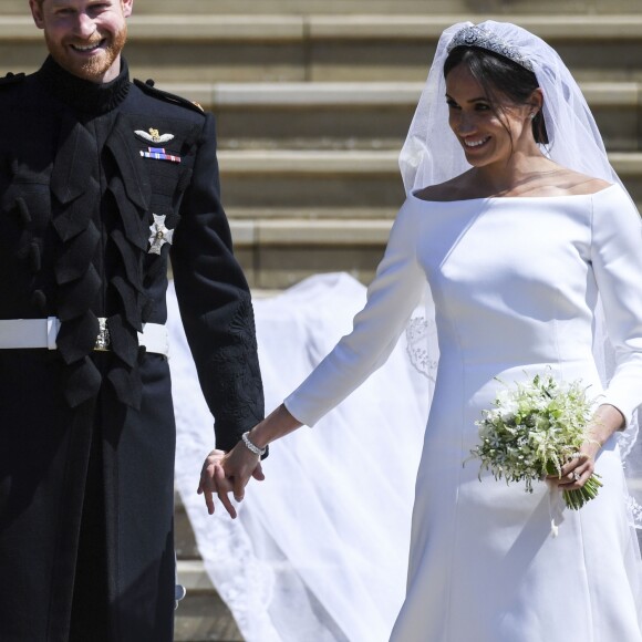 Le prince Harry, duc de Sussex, et Meghan Markle, duchesse de Sussex, à la sortie de chapelle St. George au château de Windsor - Sortie après la cérémonie de mariage du prince Harry et de Meghan Markle en la chapelle Saint-George au château de Windsor, Royaume Uni, le 19 mai 2018.