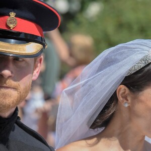 Le prince Harry, duc de Sussex, et Meghan Markle, duchesse de Sussex, en calèche au château de Windsor après la cérémonie de leur mariage au château de Windsor, Royaume Uni, le 19 mai 2018.