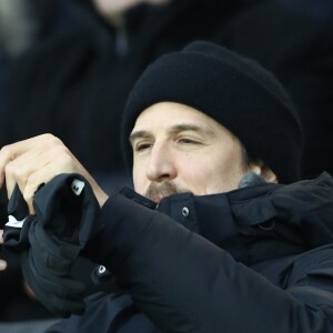 Guillaume Canet - People dans les tribunes du match de football PSG - Guingamp (9-0) au Parc des Princes à Paris le 19 janvier 2019.