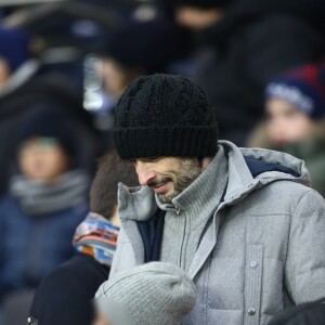 Michaël Cohen et son fils Surifel - People dans les tribunes du match de football PSG - Guingamp (9-0) au Parc des Princes à Paris le 19 janvier 2019.