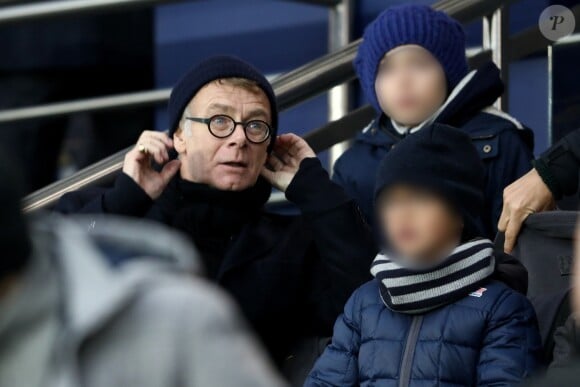 Franck Dubosc, ses enfants Milhan et Raphaël - People dans les tribunes du match de football PSG - Guingamp (9-0) au Parc des Princes à Paris le 19 janvier 2019.