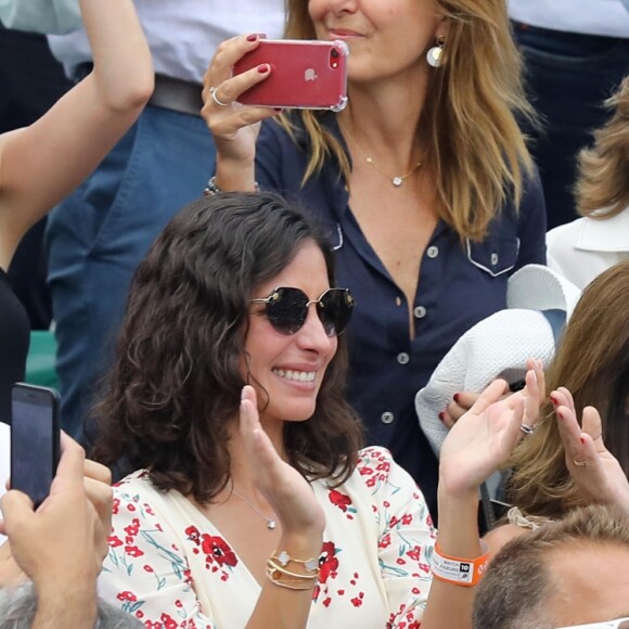 Ana Maria Parera (la mère de R. Nadal), Maria Isabel Nadal (soeur de R. Nadal) avec son compagnon Pep Juaneda et Xisca Perello, la compagne de R. Nadal - Rafael Nadal gagne son onzième Roland-Garros face à D. Thiem à Paris, le 10 juin 2018. © Jacovides/Moreau/Bestimage  Rafael Nadal of Spain is winning his 11th French Open during the trophy ceremony on Day 15 of the 2018 French Open at Roland Garros stadium on June 10, 2018 in Paris, France.10/06/2018 - Paris