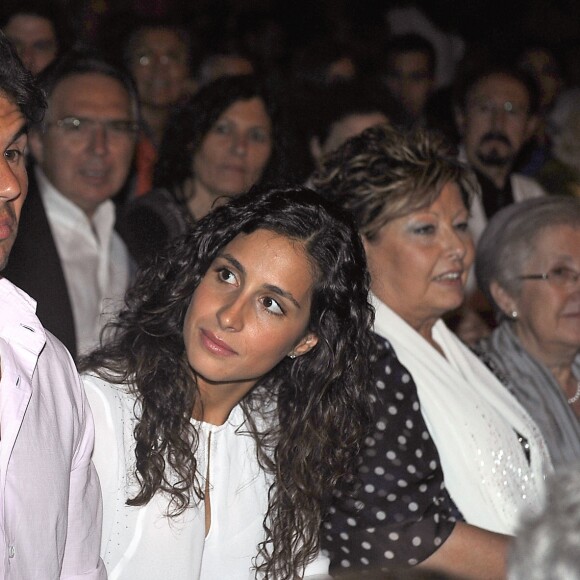 Rafael Nadal et sa compagne Maria Francisca "Xisca" Perello assistent au concert de Julio Iglesias à Barcelone le 26 juin 2013