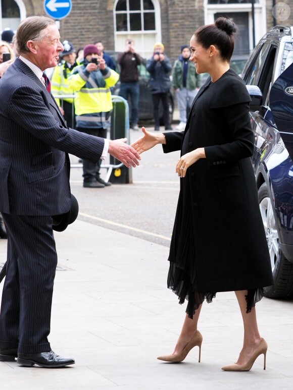 Meghan Markle, enceinte, duchesse de Sussex, arrive à l'Université de Londres pour rencontrer des membres de l'Association des Universités du Commonwealth (ACU) le 31 janvier 2019.