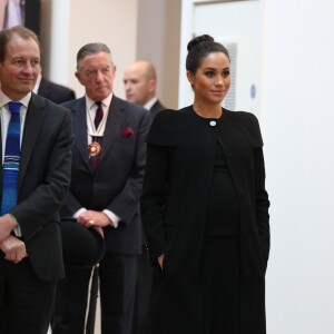 Meghan Markle, enceinte, duchesse de Sussex, arrive à l'Université de Londres pour rencontrer des membres de l'Association des Universités du Commonwealth (ACU) le 31 janvier 2019.