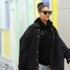 Exclusif - Rihanna porte un sac Christian Dior à son arrivée à l'aéroport de JFK à New York, le 13 janvier 2019.