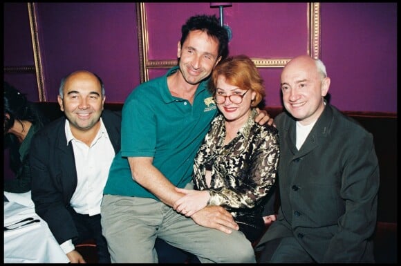 Gérard Jugnot, Thierry Lhermitte, Josiane Bakasko et Michel Blanc à Paris en 1997.
