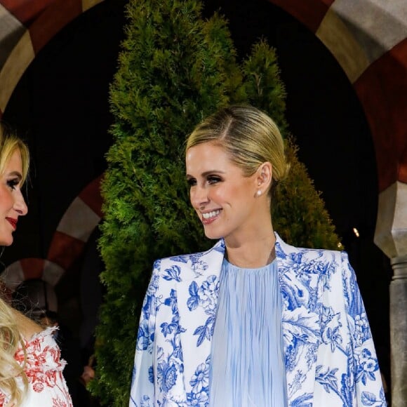 Paris et Nicky Hilton - Défilé Oscar de la Renta, collection automne-hiver 2019-2020 au Cipriani 25 Broadway, dans le Cunard Building. New York, le 12 février 2019.