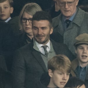 David Beckham, Cruz Beckham - People en tribune lors du match de 8ème de finale aller de Ligue des champions PSG vs Manchester à Manchester le 12 février 2019.