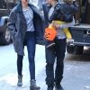 Miranda Kerr et Orlando Bloom avec leur fils Flynn dans les rues de New York, le 28 octobre 2013.