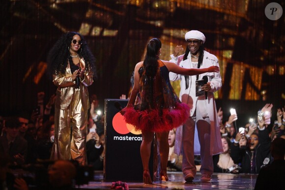 Nile Rodgers, H.E.R, Jorja Smith lors de la cérémonie des "Brit Awards 2019" à l'O2 Arena à Londres, le 20 février 2019.
