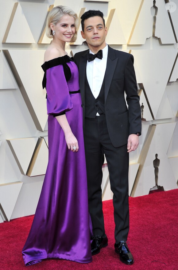 Lucy Boynton et son compagnon Rami Malek lors du photocall des arrivées de la 91ème cérémonie des Oscars 2019 au théâtre Dolby à Hollywood, Los Angeles, Californie, Etats-Unis, le 24 février 2019.