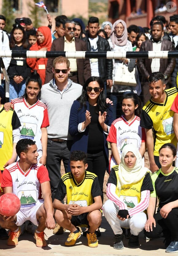 Le prince Harry et Meghan Markle, duchesse de Sussex, enceinte, lors de leur visite au Lycée Qualifiant Grand Atlas à Asni au Maroc, le 24 février 2019.