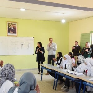 Le prince Harry et Meghan Markle, duchesse de Sussex, enceinte, lors de leur visite au Lycée Qualifiant Grand Atlas à Asni au Maroc, le 24 février 2019.