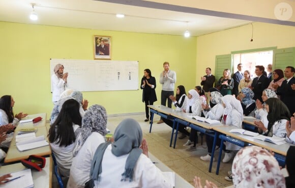 Le prince Harry et Meghan Markle, duchesse de Sussex, enceinte, lors de leur visite au Lycée Qualifiant Grand Atlas à Asni au Maroc, le 24 février 2019.