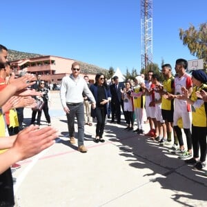 Le prince Harry et Meghan Markle, duchesse de Sussex, enceinte, lors de leur visite au Lycée Qualifiant Grand Atlas à Asni au Maroc, le 24 février 2019.