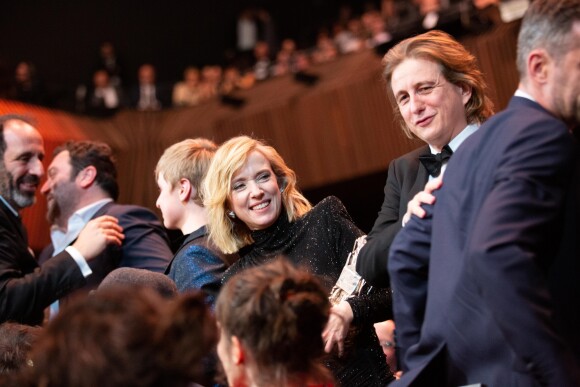 Léa Drucker à côté de son compagnon Julien Rambaldi lors de la cérémonie des César le 22 février 2019