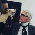 Karl Lagerfeld et sa chatte, Choupette, dans les bras de sa gouvernante Françoise. 