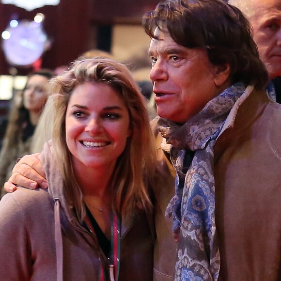 Bernard Tapie et sa fille Sophie - Dans le cadre du Gucci Paris Masters a eu lieu l'epreuve "Style & Competition for AMADE" a Villepinte le 7 décembre 2013.