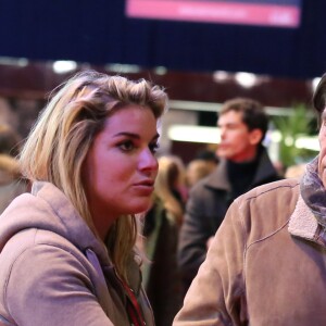 Bernard Tapie avec sa fille sophie - Dans le cadre du Gucci Paris Masters a eu lieu l'epreuve "Style & Competition for AMADE" a Villepinte le 7 décembre 2013.