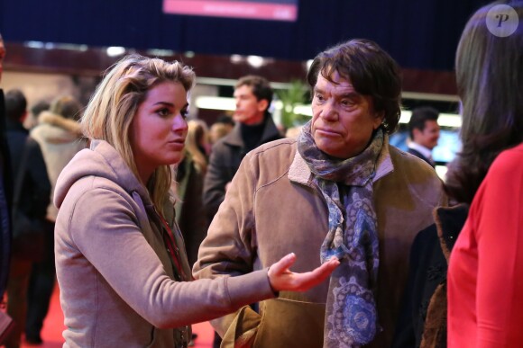 Bernard Tapie avec sa fille sophie - Dans le cadre du Gucci Paris Masters a eu lieu l'epreuve "Style & Competition for AMADE" a Villepinte le 7 décembre 2013.