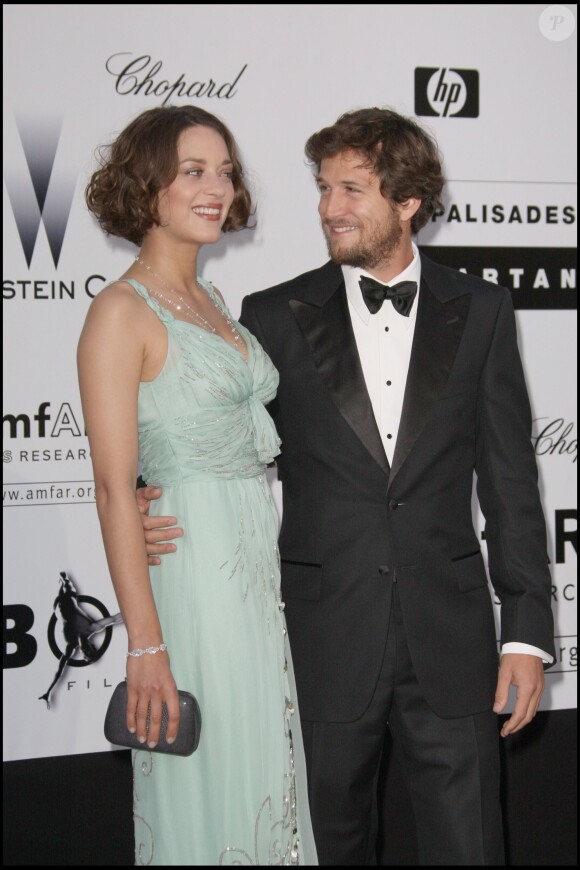 Marion Cotillard et son compagnon Guillaume Canet lors de la soirée de l'amfAR en 2009