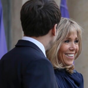 Le président Emmanuel Macron, la première dame Brigitte Macron - Le président de la République française et sa femme accueillent le roi et la reine de Jordanie au palais de l'Elysée à Paris le 29 mars 2019. © Stéphane Lemouton / Bestimage