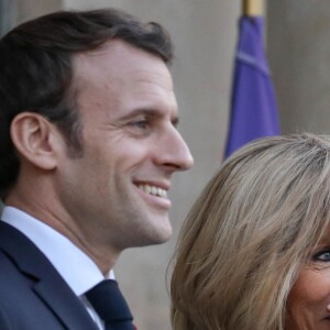 Le président Emmanuel Macron, la première dame Brigitte Macron - Le président de la République française et sa femme accueillent le roi et la reine de Jordanie au palais de l'Elysée à Paris le 29 mars 2019. © Stéphane Lemouton / Bestimage