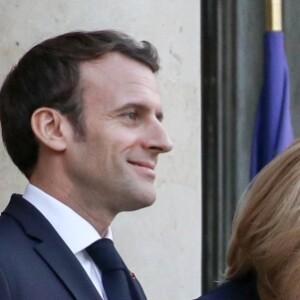 Le président Emmanuel Macron, la première dame Brigitte Macron - Le président de la République française et sa femme accueillent le roi et la reine de Jordanie au palais de l'Elysée à Paris le 29 mars 2019. © Stéphane Lemouton / Bestimage