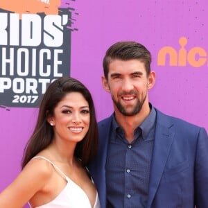 Michael Phelps et sa femme Nicole Johnson à la soirée Nickelodeon Kids' Choice Sports Award au UCLA Pauley Pavilion à Westwood, le 13 juillet 2017.