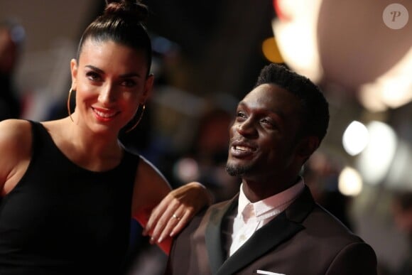Corneille et sa femme Sofia de Medeiros - 16ème édition des NRJ Music Awards à Cannes. Le 13 décembre 2014.
