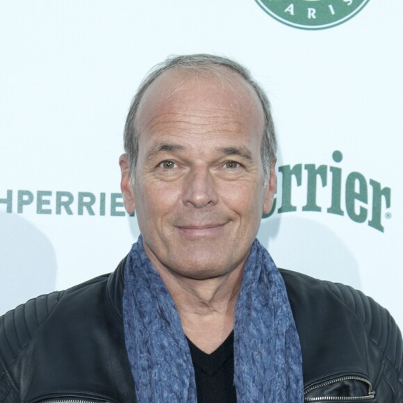 Laurent Baffie - Evénement "Smash Perrier" du deuxième étage de la Tour Eiffel au Champ-de-Mars à Paris le 8 juin 2017. Organisé en guise de clin d'oeil au tournoi de Roland-Garros qui se déroule à quelques hectomètres de là et auquel Perrier est associé depuis 39 ans, le Smash Perrier vous propose le smash le plus fou de tous les temps ! Une minute de pur frisson à 90km/h accroché à un câble de 800 mètres de long pour se glisser dans la peau d'une balle de tennis smashée du haut de la célèbre "dame de fer". © Pierre Perusseau/Bestimage