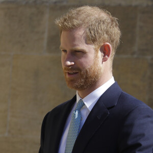 Le prince Harry, duc de Sussex, arrive pour assister à la messe de Pâques à la chapelle Saint-Georges du château de Windsor, le 20 avril 2019.