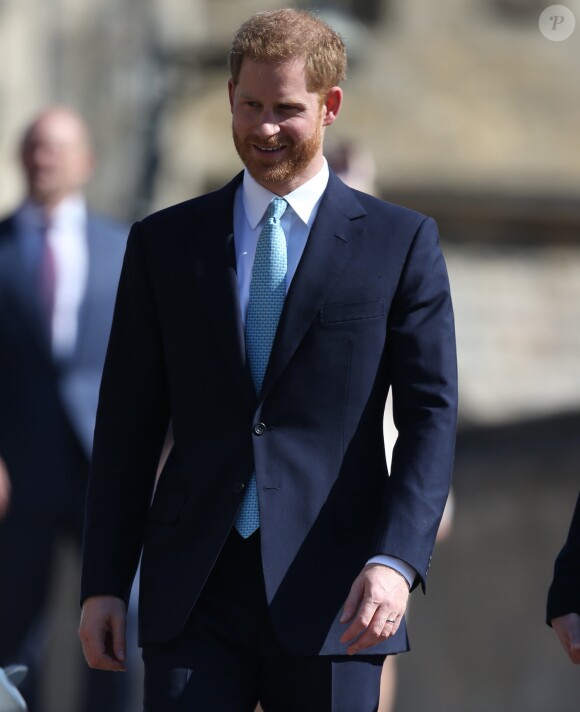 Le prince Harry, duc de Sussex, arrive pour assister à la messe de Pâques à la chapelle Saint-Georges du château de Windsor, le 20 avril 2019.