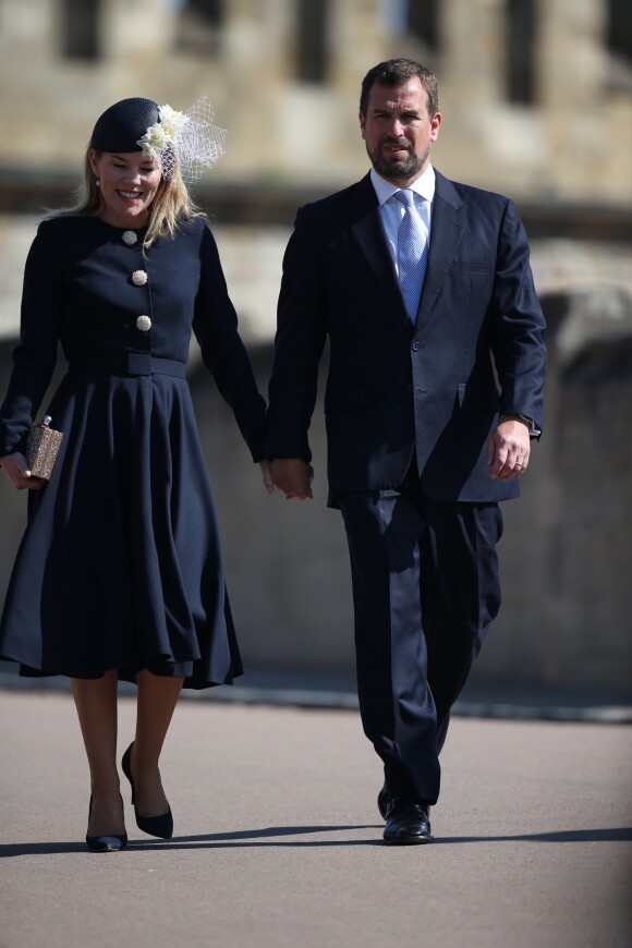 Autumn Phillips et Peter Phillips arrivent pour assister à la messe de Pâques à la chapelle Saint-Georges du château de Windsor, le 20 avril 2019.