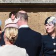 Catherine (Kate) Middleton, duchesse de Cambridge, et Zara Phillips (Zara Tindall) arrivent pour assister à la messe de Pâques à la chapelle Saint-Georges du château de Windsor, le 20 avril 2019.