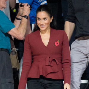 Le prince Harry, duc de Sussex, et Meghan Markle, duchesse de Sussex, enceinte, assistent à la cérémonie de clôture des Invictus Games 2018 à Sydney, le 27 octobre 2018.