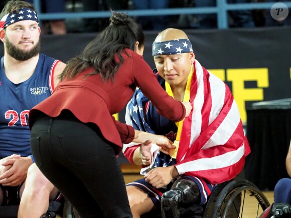 Le prince Harry, duc de Sussex, et Meghan Markle, duchesse de Sussex, enceinte, assistent à la cérémonie de clôture des Invictus Games 2018 à Sydney, le 27 octobre 2018.