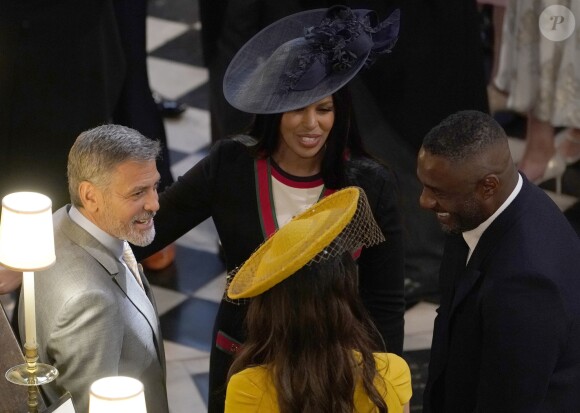 George Clooney, sa femme Amal, Idris Elba et Sabrina Dhowre - Cérémonie de mariage du prince Harry et de Meghan Markle en la chapelle Saint-George au château de Windsor, Royaume Uni, le 19 mai 2018.