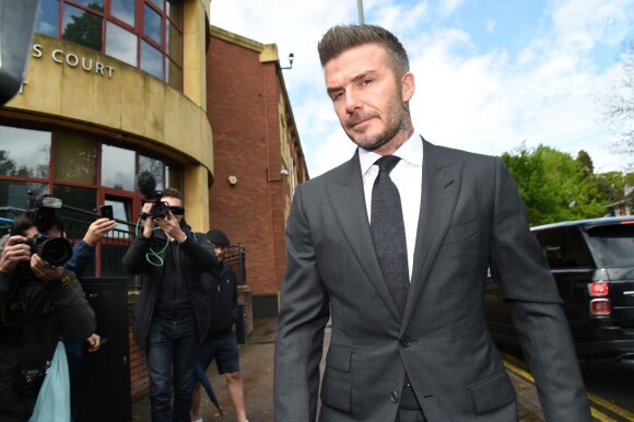 L'ancien footballeur international anglais David Beckham arrive au tribunal de première instance de Bromley, Kent, le 9 mai 2019. Le footballeur doit comparaître devant le tribunal pour une audience complète après avoir admis avoir utilisé un téléphone portable au volant le 21 novembre 2018.