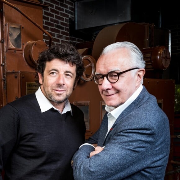 Exclusif - Rencontre gastronomique entre Alain Ducasse et Patrick Bruel pour la création d'un coffret de chocolats à l'huile d'olive. À l'occasion de la fête des Mères, la Manufacture de chocolat Alain Ducasse sortira une recette de ganache à l'huile d'olive provenant de la propriété de Patrick Bruel, le Domaine LEOS à l'Isle-sur-la-Sorgue, maintes fois reconnu et récompensé (trois médailles d'or au Concours Général Agricole). Le coffret est disponible en édition limitée le 3 mai prochain au prix de 36€ pour 21 pièces. Paris, le 24 avril 2019 © Cyril Moreau / Bestimage