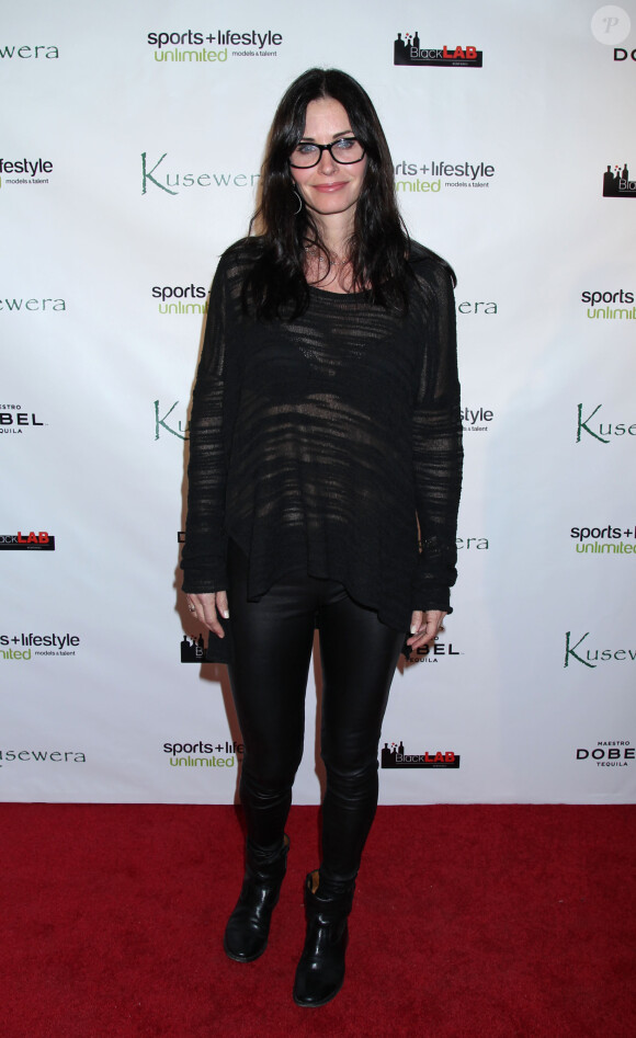 Courteney Cox à la Soirée "Kusewera Red Carpet" à Los Angeles, le 22 février 2014 