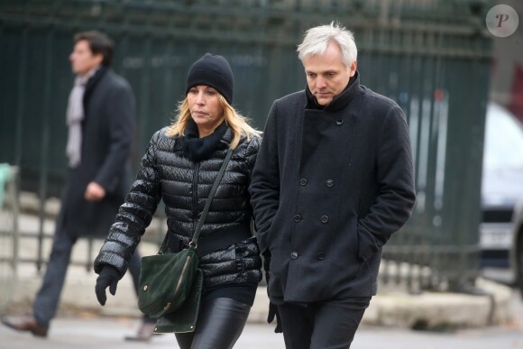 Mathilde Seigner et son compagnon MAthieu Petit - Sorties de l'église de la Madeleine après les obsèques de Johnny Hallyday à Paris - Le 9 décembre 2017