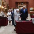  Donald Trump et son épouse Melania ont découvert une exposition spéciale sur les liens entre les Etats-Unis et la Grande-Bretagne dans la Picture Gallery au palais de Buckingham le 3 juin 2019, accompagnés par la reine Elizabeth II, le prince Charles et le prince Andrew. 
