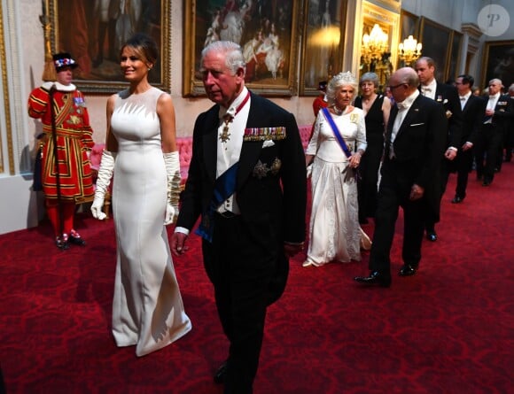 Melania Trump (en robe Dior) et le prince Charles au palais de Buckingham le 3 juin 2019 pour le dîner de gala donné par la reine Elizabeth II en l'honneur de la visite officielle du président américain Donald Trump et son épouse Melania.