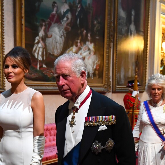 Melania Trump (en robe Dior) et le prince Charles au palais de Buckingham le 3 juin 2019 pour le dîner de gala donné par la reine Elizabeth II en l'honneur de la visite officielle du président américain Donald Trump et son épouse Melania.