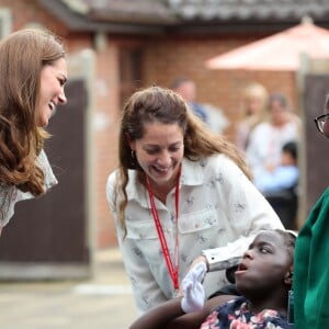 Kate Catherine Middleton, duchesse de Cambridge, participe à un atelier en partenariat avec l'association "Action for Children" à la Royal Photographic Society à Londres. Le 25 juin 2019