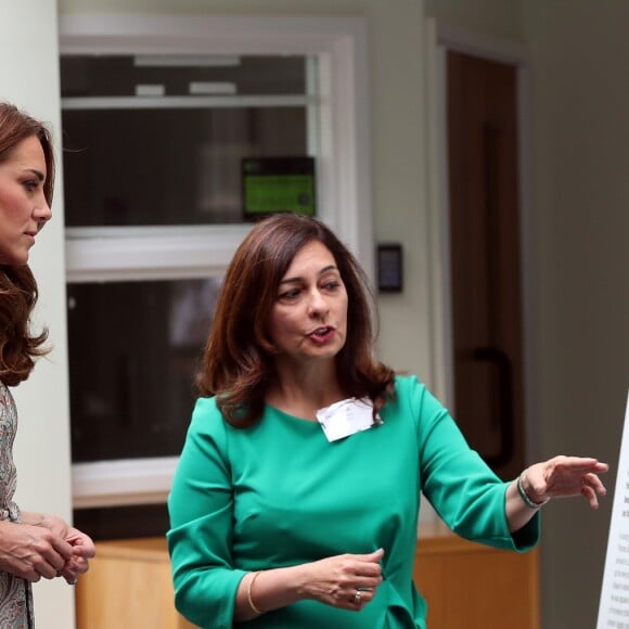 Kate Catherine Middleton, duchesse de Cambridge, participe à un atelier en partenariat avec l'association "Action for Children" à la Royal Photographic Society à Londres. Le 25 juin 2019